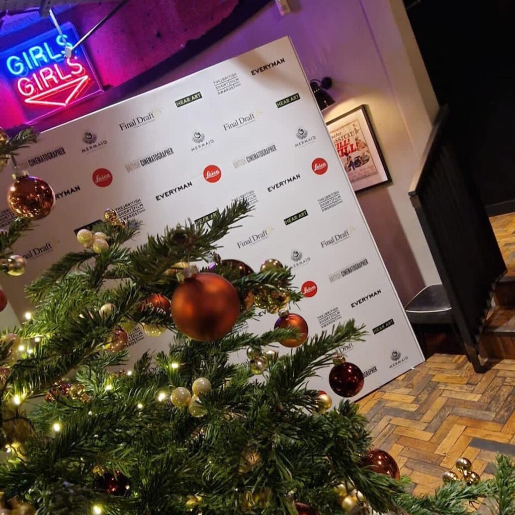 christmas event logo wall